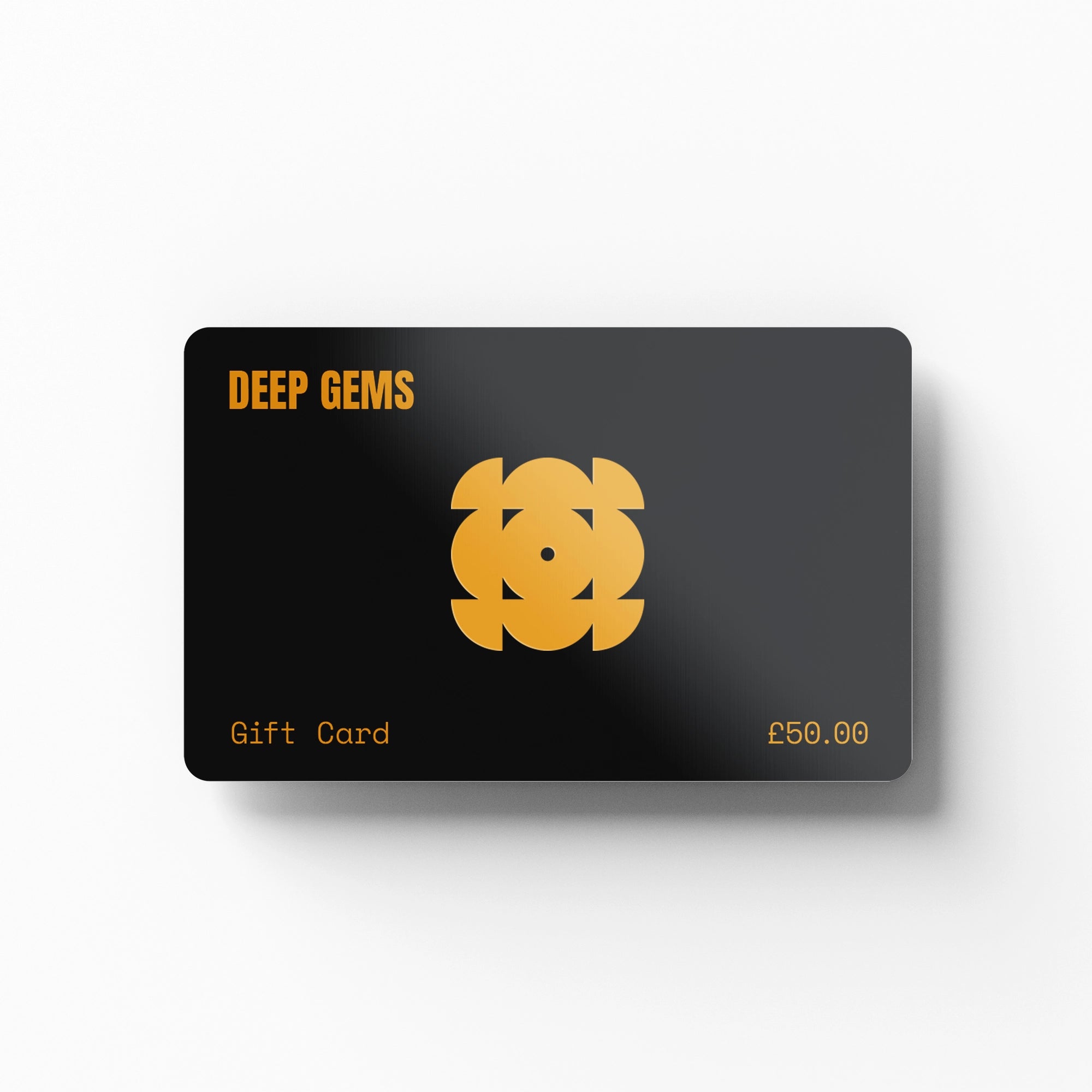 A black gift card with a gold geometric logo and the text 'DEEP GEMS', 'Gift Card', and '£50.00' on a clean white background.