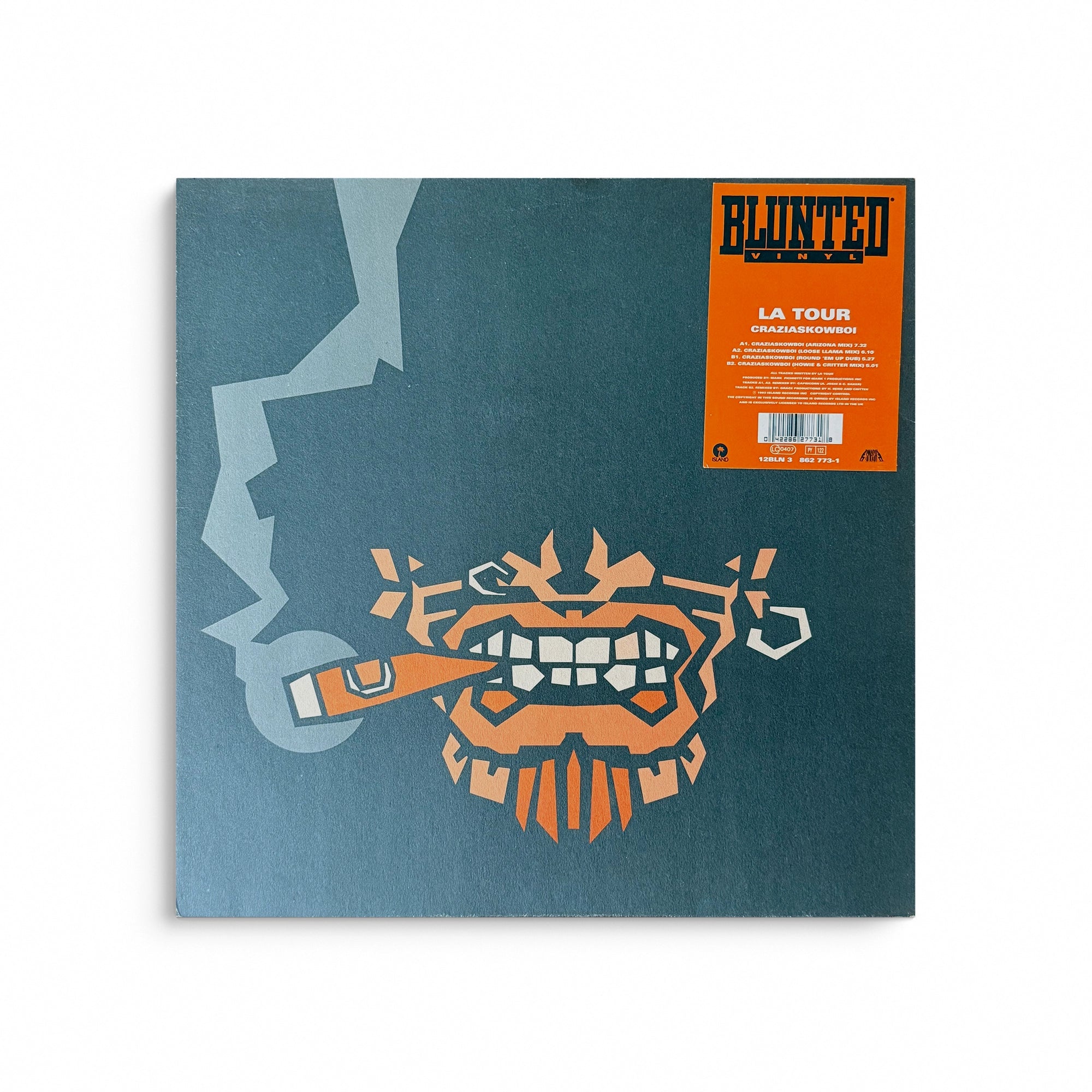 La Tour Craziaskowboi vinyl record sleeve, featuring a stylized orange and white cartoon face smoking a cigar on a muted teal-blue background, with an orange sticker label in the top right corner.